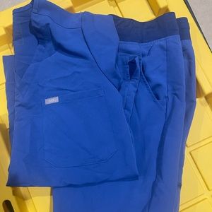 3 sets of figs scrubs